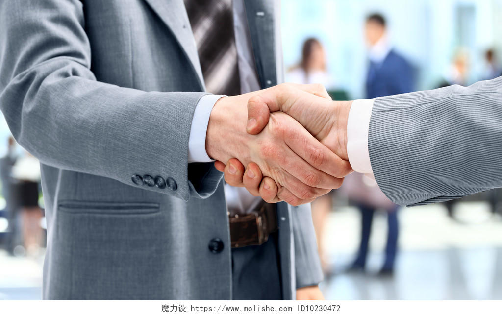 穿着西装握手合作团结握手团结手势合作平台商务合作握手